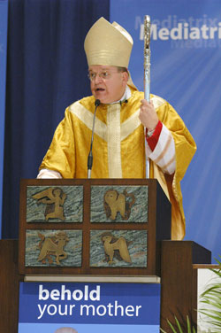 Archbishop Raymond L. Burke of St. Louis delivers the homily during the Oct. 13 Mass celebrated at the “Behold Your Mother” conference at Our Lady of the Greenwood Church in Greenwood. The event was sponsored by the Franciscan Friars of the Immaculate. Members of the order staff the Mother of the Redeemer Retreat Center in Monroe County.