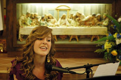 Francesca LaRosa is scheduled to sing the ballad version of the theme song “Called to Glory” for the 2011 National Catholic Youth Conference in Indianapolis in November. Here, the senior at Roncalli High School in Indianapolis performs during a musical program at St. Roch Church in Indianapolis on June 6. (Photo by John Shaughnessy)