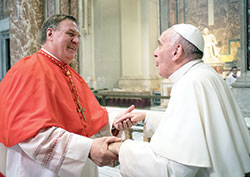 New Cardinal Joseph W. Tobin and Pope Francis enjoy a conversation inside St. Peter’s Basilica at the Vatican on Nov. 19. (Photo courtesy L’Osservatore Romano) 