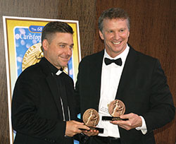 Dr. Chuck Dietzen is pictured with Father Jonathan Morris of The Christophers on May 16 in New York. Dietzen received the organization’s James Keller award, and a Christopher Award for his recent book, Pint-Sized Prophets: Inspirational Moments That Taught Me We Are All Born to Be Healers. He is the first person to receive two awards from the organization in the same year. (Submitted photo by Charles Schisla)