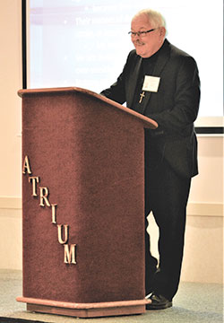 Oblates of Mary Immaculate Father Ronald Rolheiser addresses participants in the archdiocesan Consolation Ministry’s Mission Day event in Indianapolis on Sept. 10. (Photo by Natalie Hoefer)