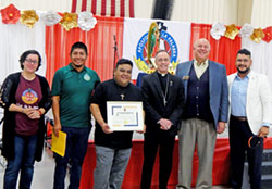 Juanita Barrera, left, Luis Xalanda and Reynaldo Gerardo, all members of St. Gabriel the Archangel Parish in Indianapolis, are pictured on Sept. 30 during a Bible conference at St. Michael the Archangel Parish in Indianapolis with Archbishop Charles C. Thompson; Ken Ogorek, executive director of the archdiocesan Secretariat for Evangelizing Catechesis; and Felix Navarrete, the archdiocese’s Hispanic ministry coordinator. The St. Gabriel parishioners are members of the board of Apostoles de la Palabra (Apostles of the Word) and were recognized for their service to Hispanic families in the archdiocese’s evangelization and catechesis mission. (Photo by Mike Krokos)