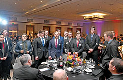 Seminarians of Bishop Bruté College Seminary in Indianapolis sing “Salve Regina” during the Legacy Gala at the JW Marriott in Indianapolis on Feb. 9. (Photo by Rob Banayote)