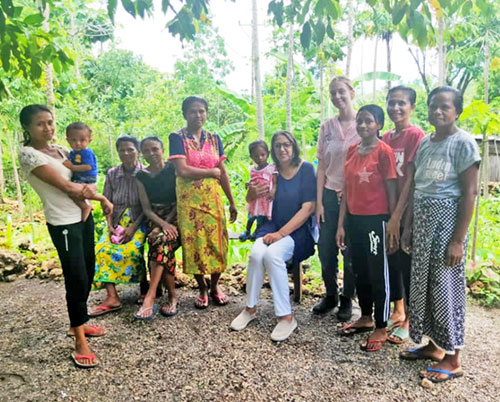 Michele Rankin, center, a volunteer with Palms Australia, is pictured in an undated photo posing with the Leohitu Women's Group in East Timor, also known as Timor-Leste, in Southeast Asia. (OSV News photo/courtesy Michele Rankin)