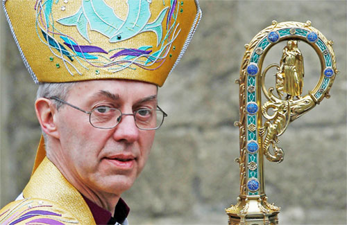 Anglican Archbishop Justin Welby of Canterbury leaves Canterbury Cathedral after his enthronement ceremony March 21, 2013. Welby announced his resignation Nov. 12, 2024, due to failures in dealing with clerical sexual abuse case in the Church of England. (OSV News photo/Luke MacGregor, Reuters)